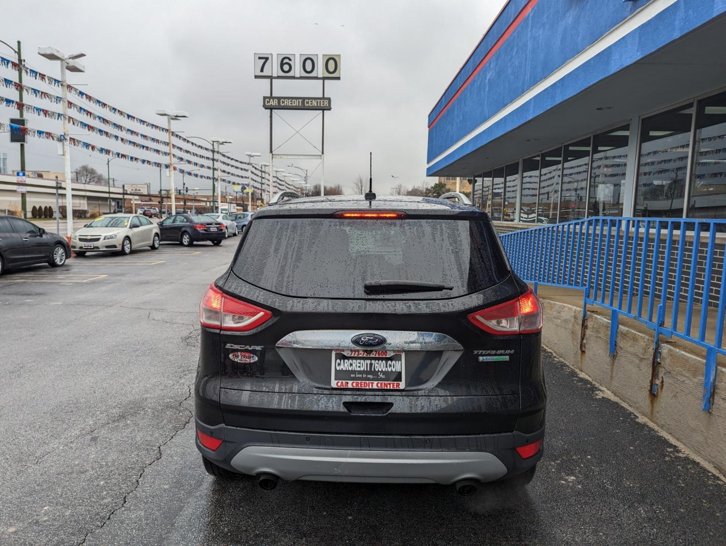 2015 BLACK Ford Escape Titanium FWD (1FMCU0JX9FU) with an 1.6L L4 DOHC 16V engine, 6-Speed Automatic transmission, located at 7600 S Western Ave., Chicago, IL, 60620, (773) 918-3980, 0.000000, 0.000000 - Photo#3